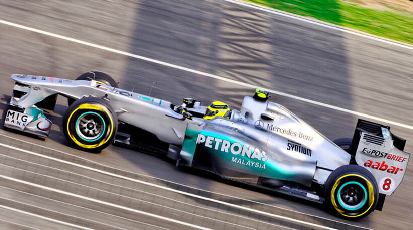 Nico Rosberg claimed pole position at a rain-affected Monaco Grand Prix qualifying.