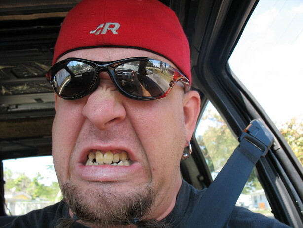 Maybe the rage sparked from seeing those teeth the car mirror 