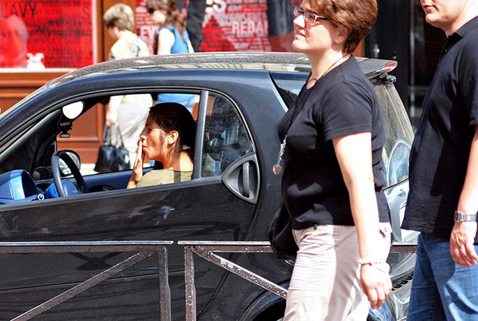 Should smoking in a car be banned when a child is present?