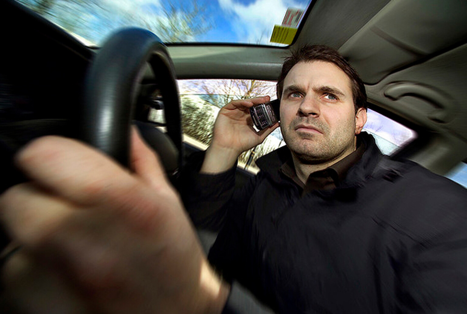Driving while using a mobile phone 'does not lead to higher crash risk'
