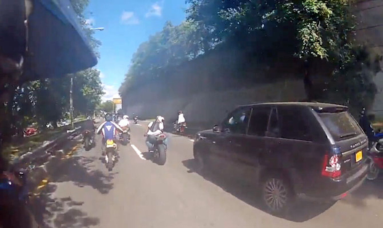 Range Rover driver runs over biker gang