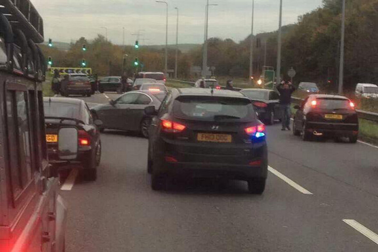 A27 closed after police fire at gun suspect's vehicle