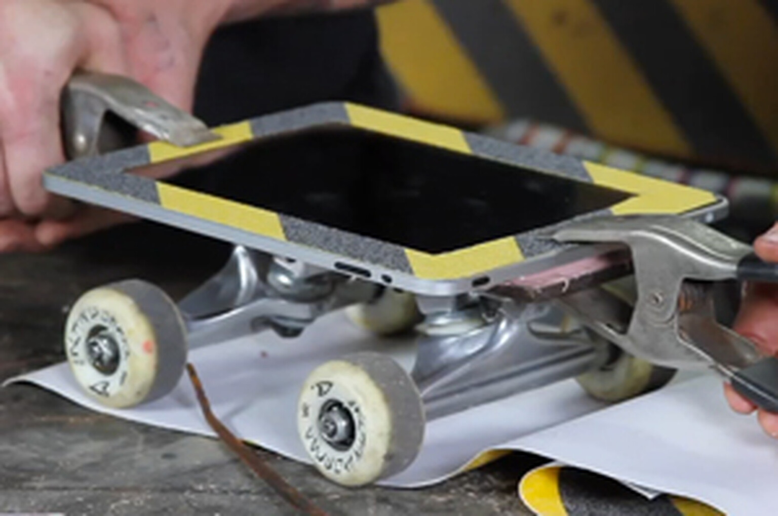 iPad turned into skateboard for your viewing pleasure
