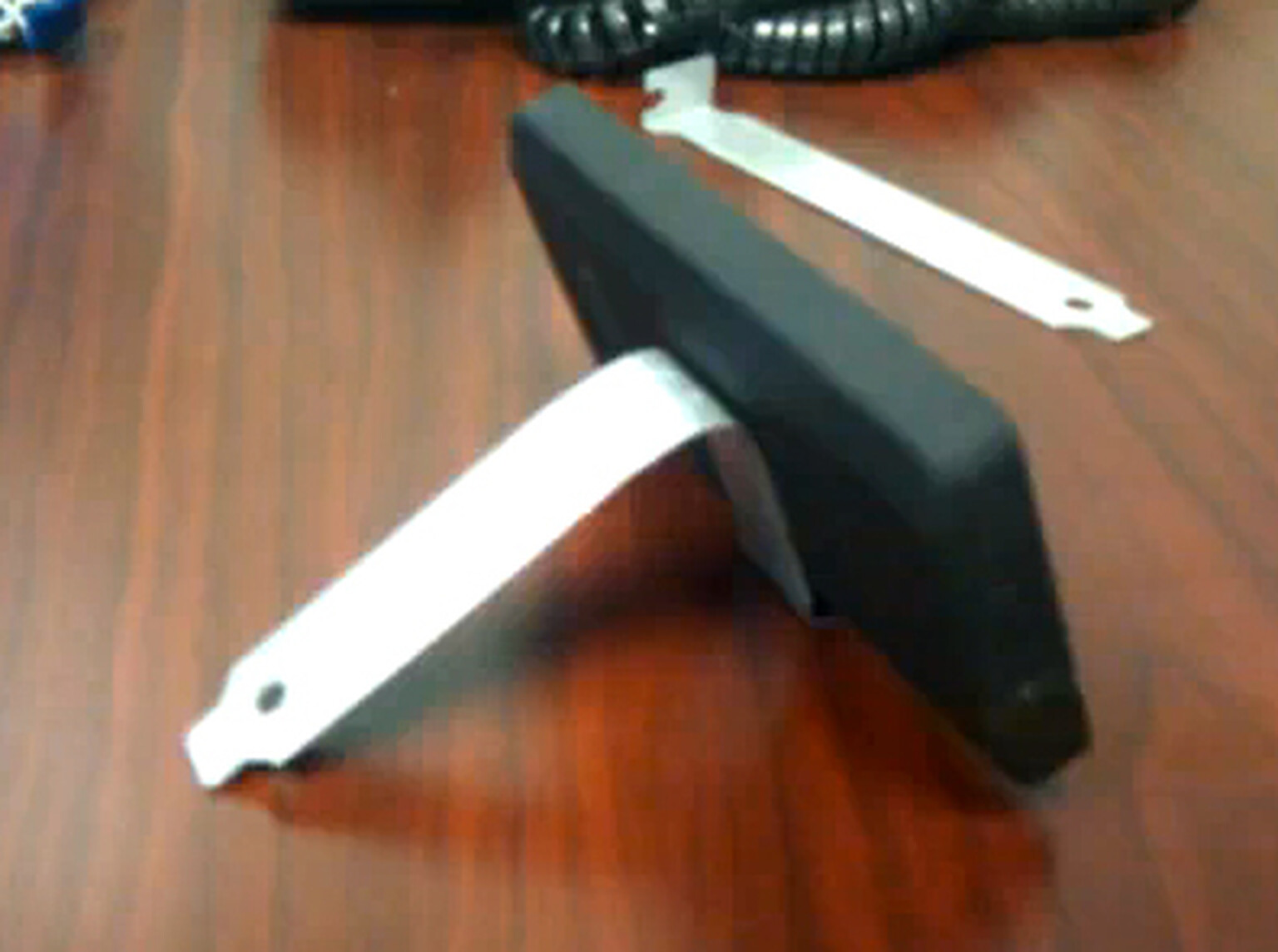 One PCI slot cover, one bend, one nifty phone stand