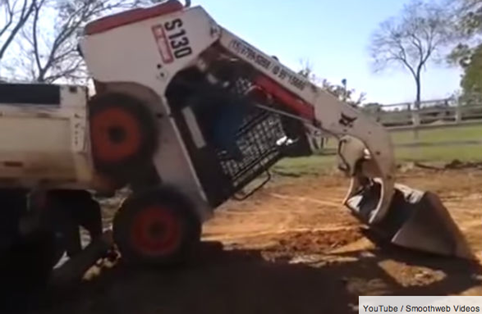 This is how you load a bobcat digger onto a trailer