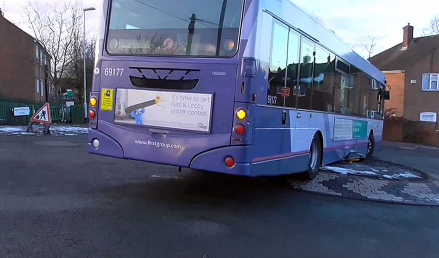 Driver gets bus stuck on roundabout after taking shortcut