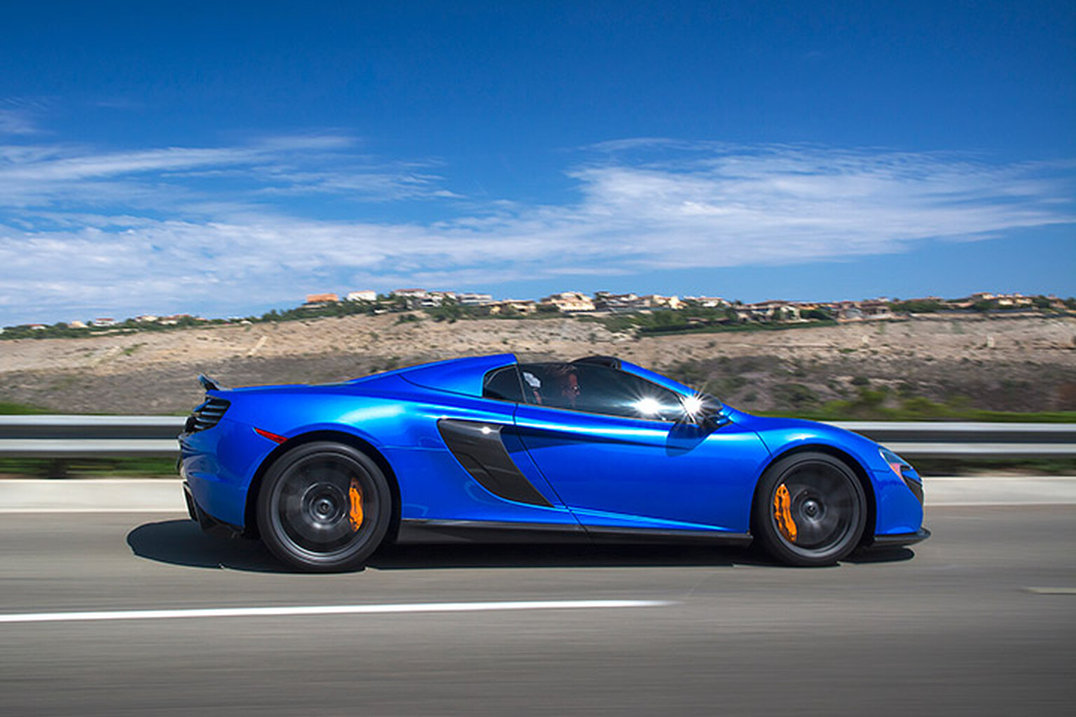 Brave McLaren salesman pulls stockbroker from burning 650S after test drive crash