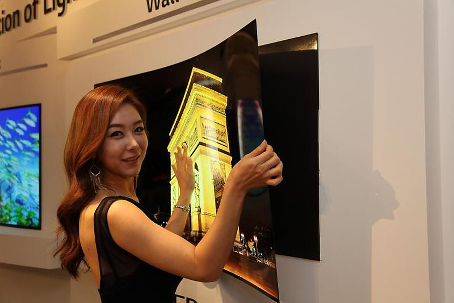 LG shows off 0.97mm thick flexible TV that you can hang on your wall