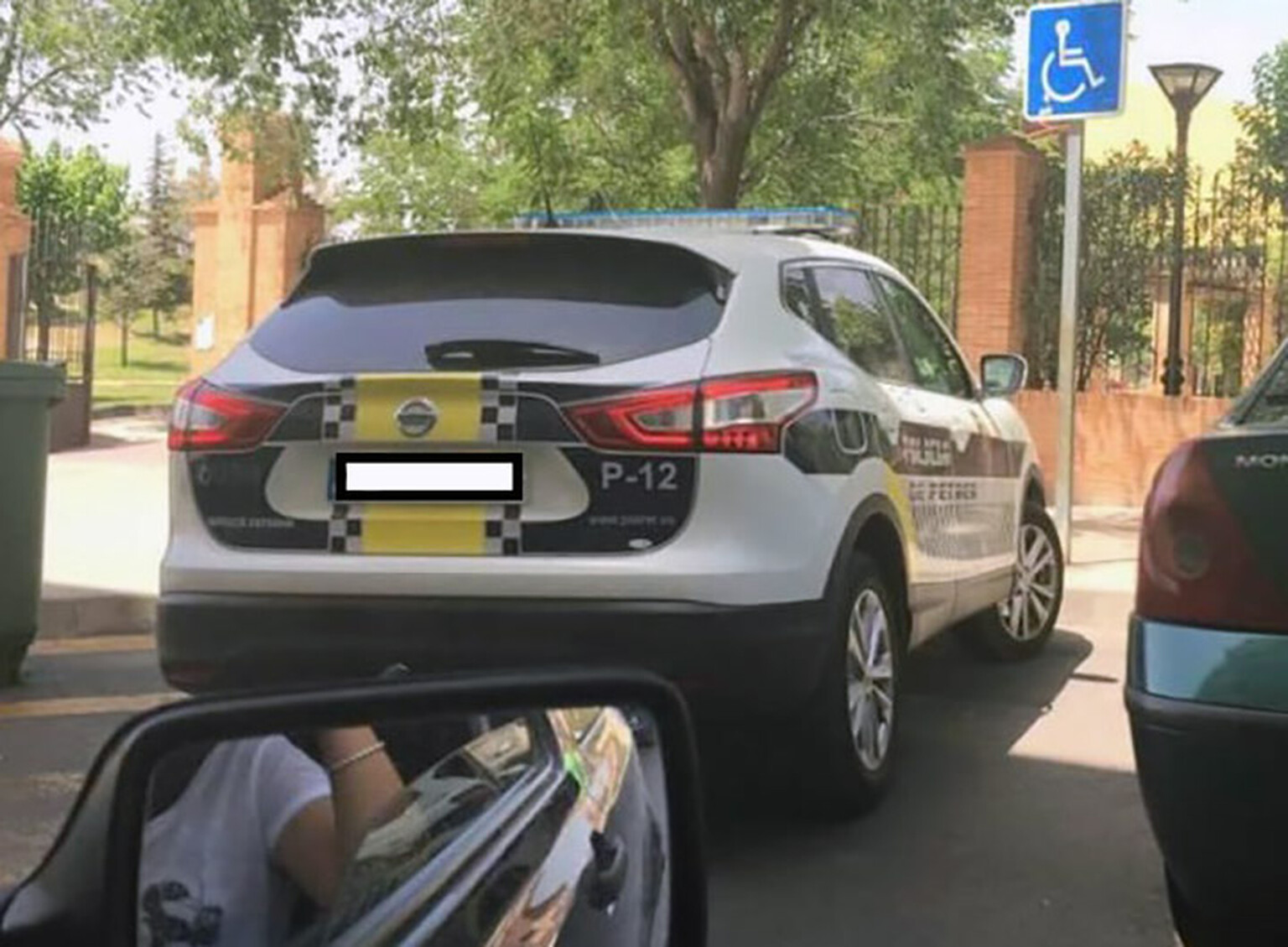 Woman fined £570 after taking picture of an ilegally parked cop car