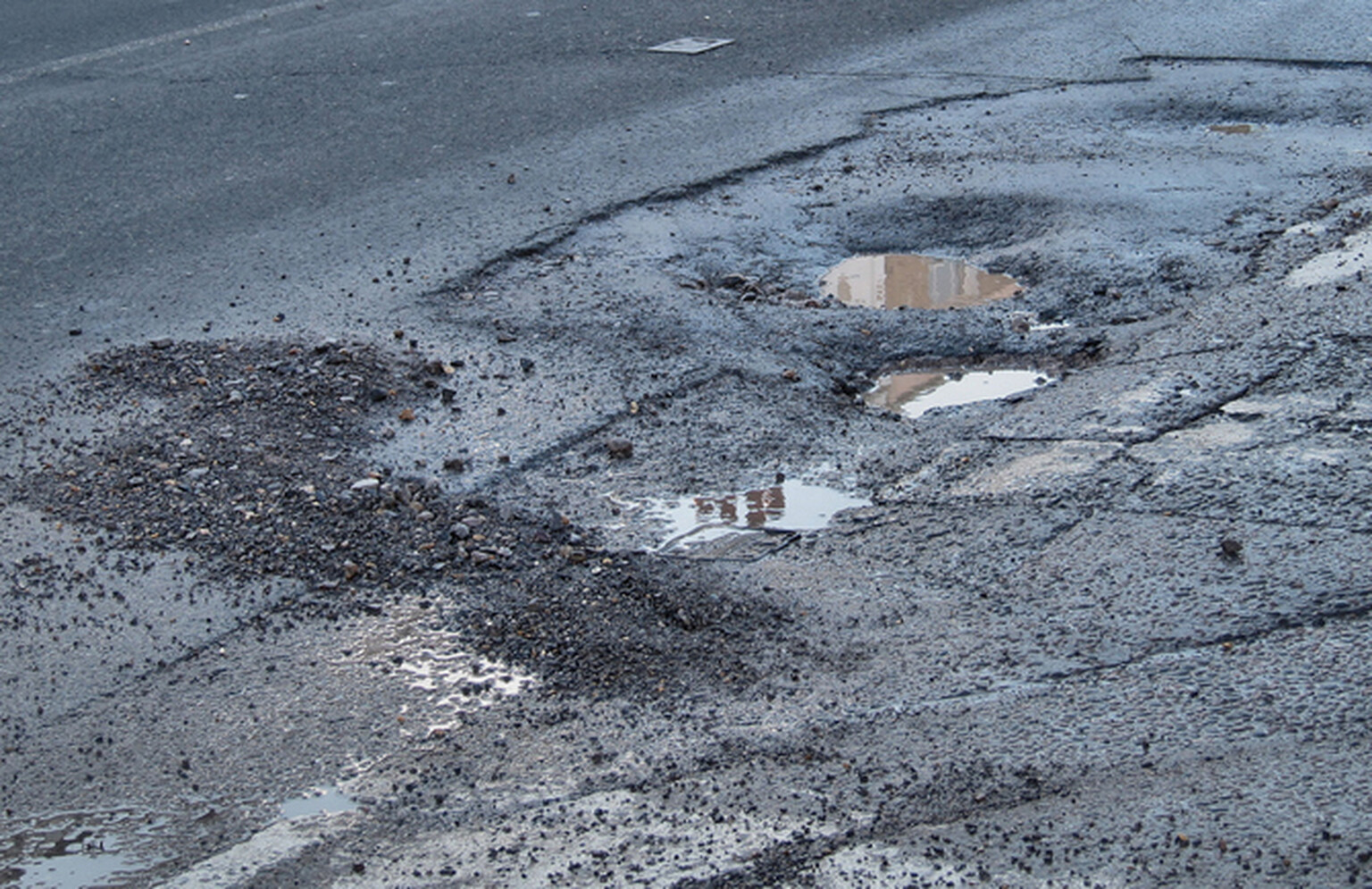Government pledges additional £140 million for road repairs
