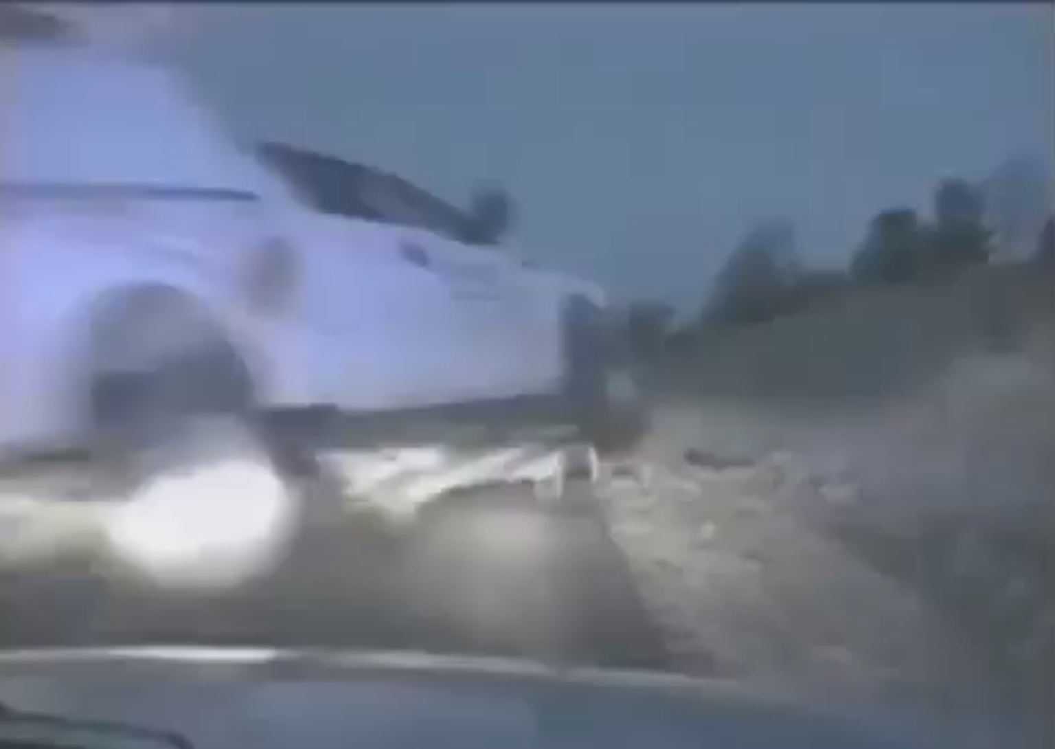 Cops avoid death by flying truck