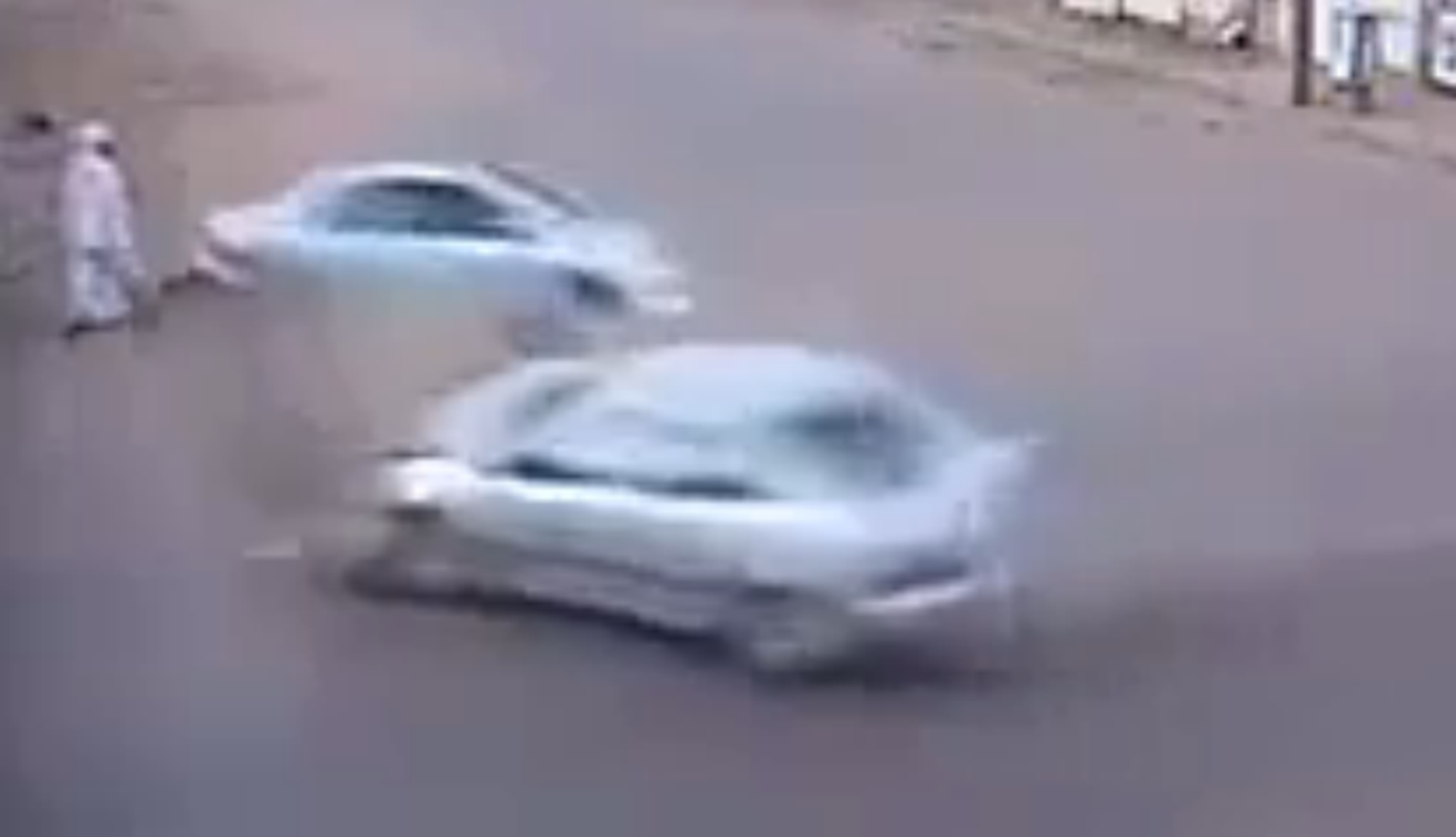 Pedestrian narrowly escapes death as cars collide at junction