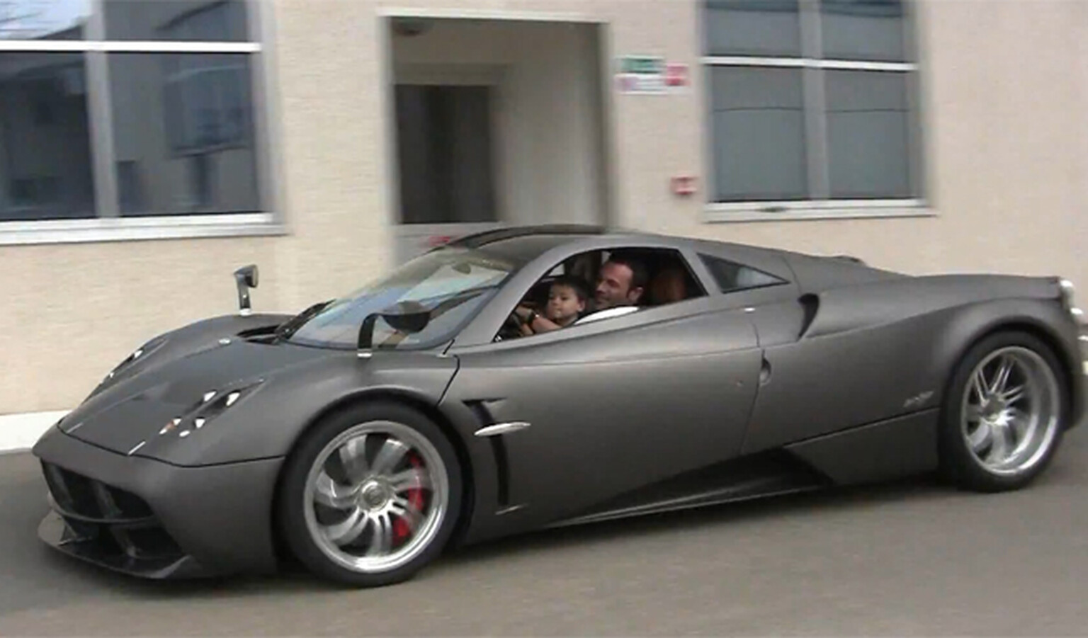 Kid goes for a ride in a US$1.2 million Pagana Huarya