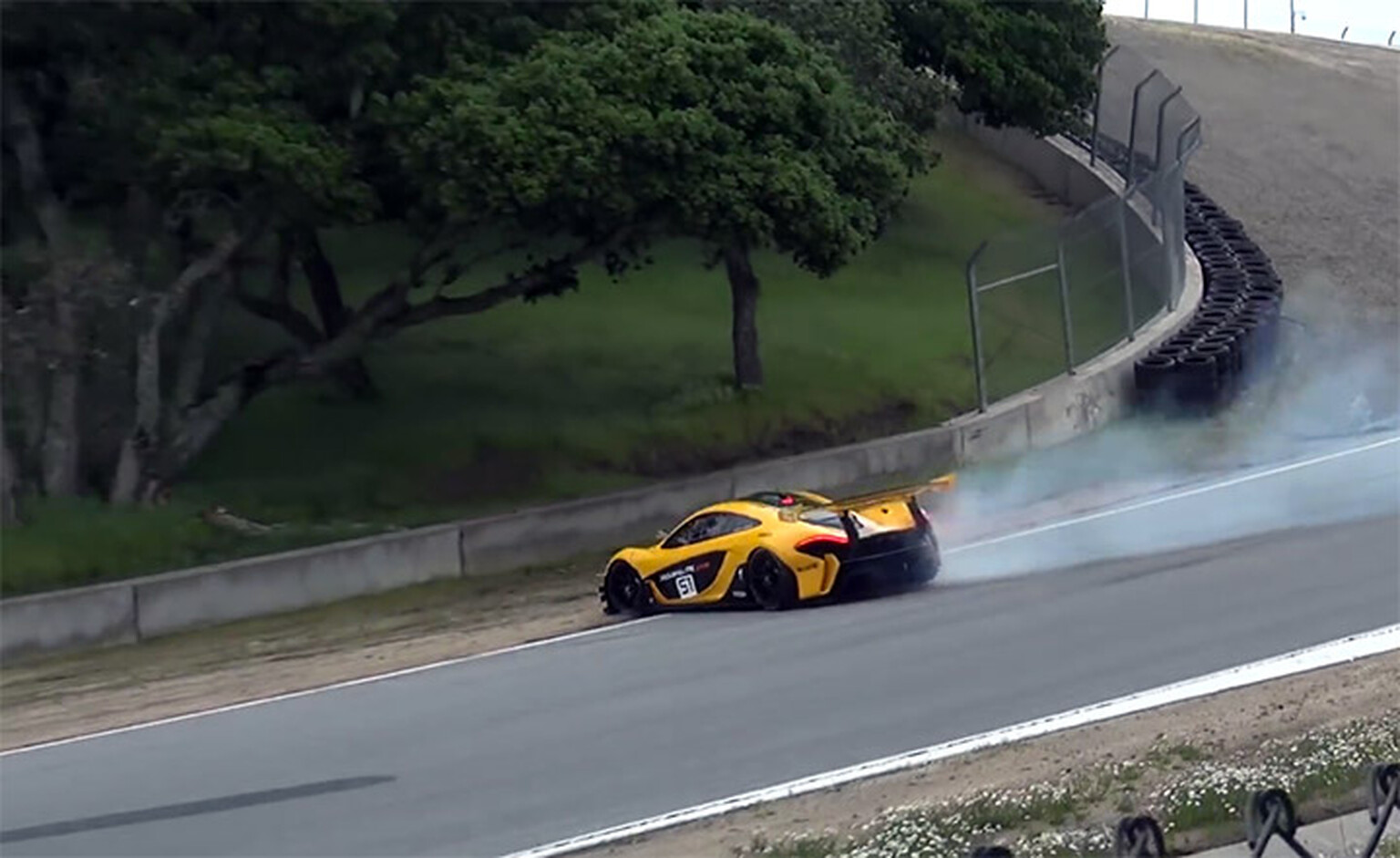 McLaren P1 GTR narrowly avoids crash at Laguna Seca