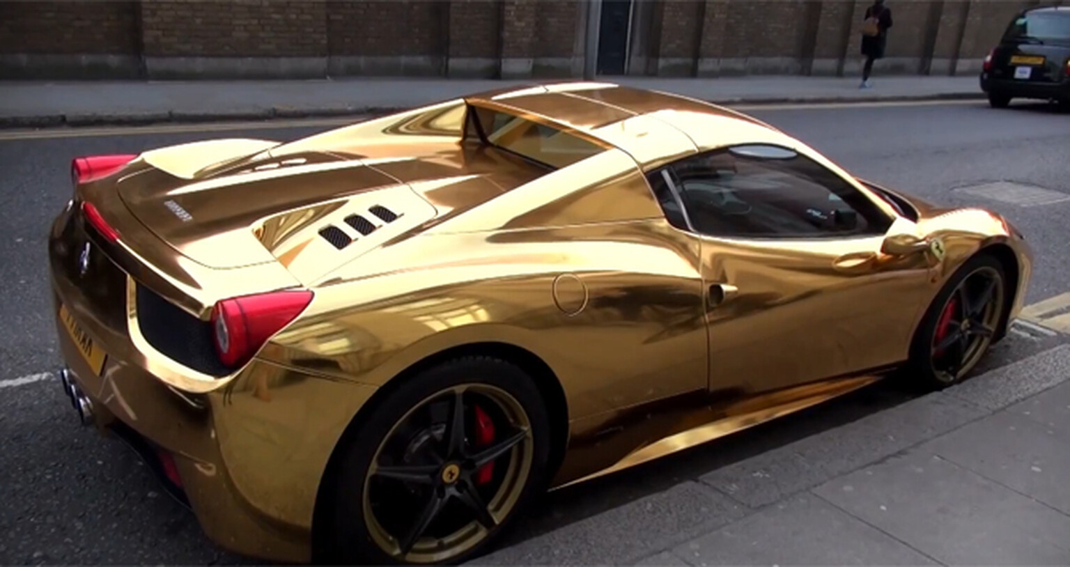 Is this gold Ferrari 458 Spider the most bling supercar ever?