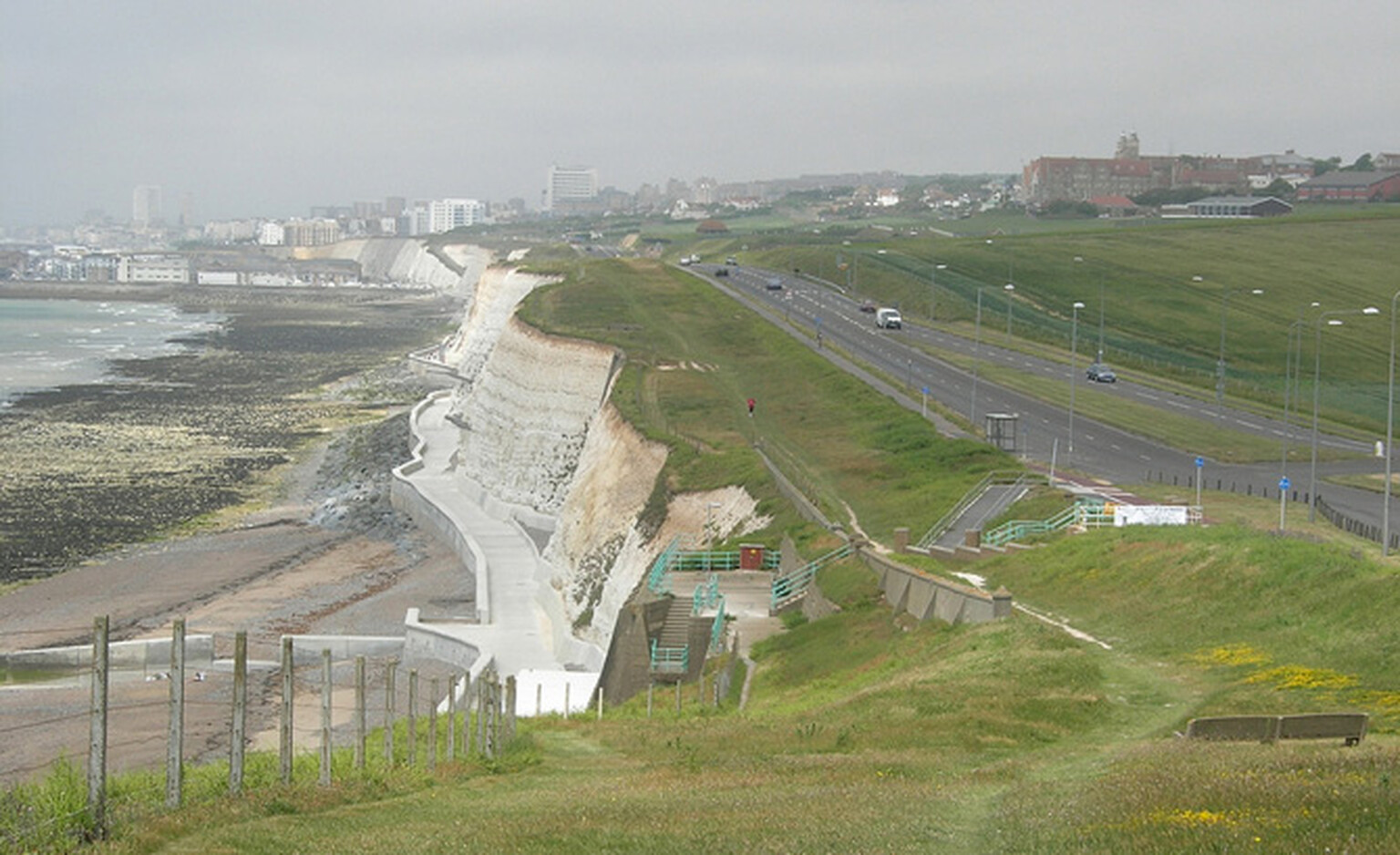 Motorist walks away from 80ft cliff drop