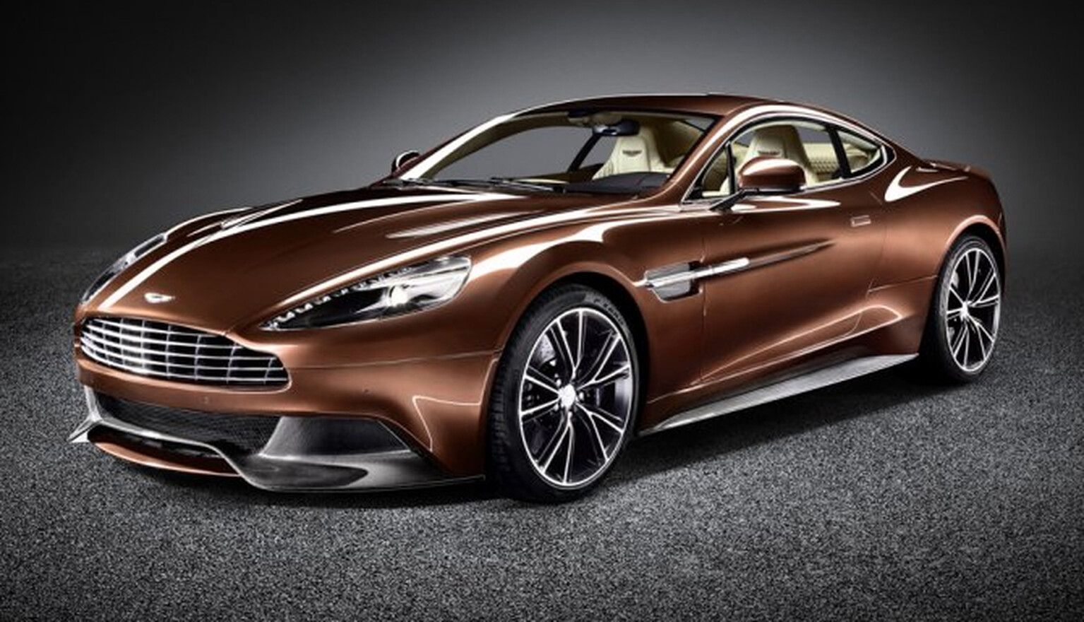 Aston Martin Vanquish images and video sets pulses racing