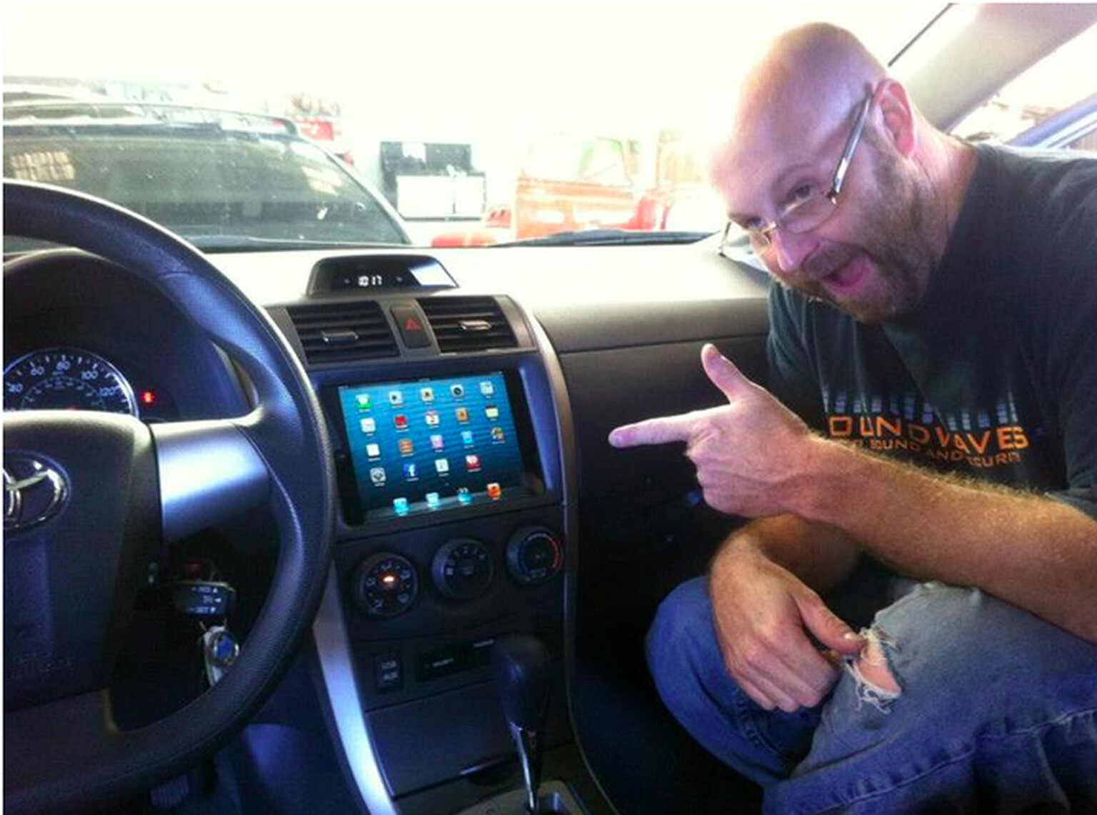 Aftermarket parts specialist installs iPad Mini in car