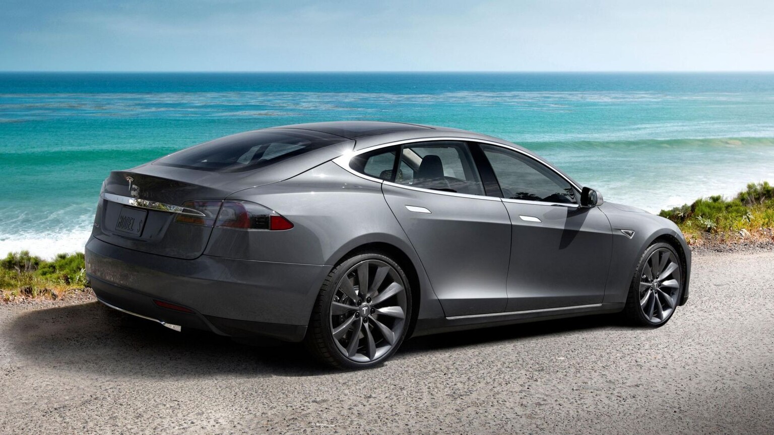 Tesla Model S splits in half, catches fire after crash