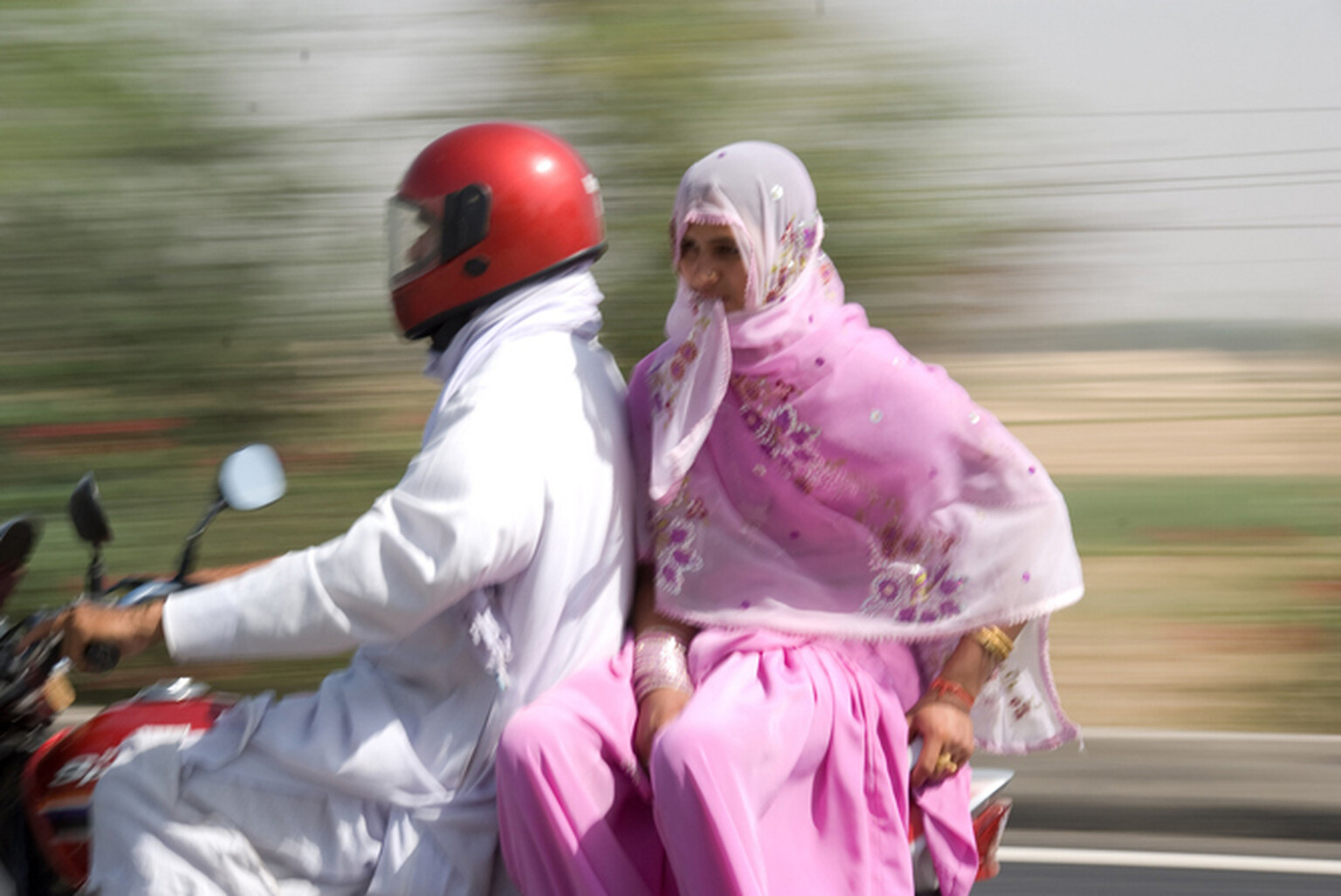 Indonesian city bans women straddling motorcycles behind men