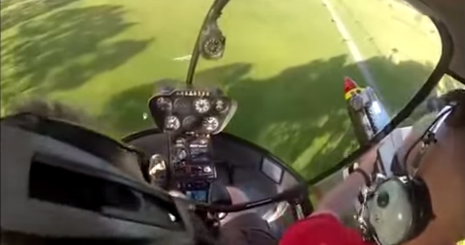 Watch this friendly helicopter pilot retrieve a kid’s RC plane from a tree