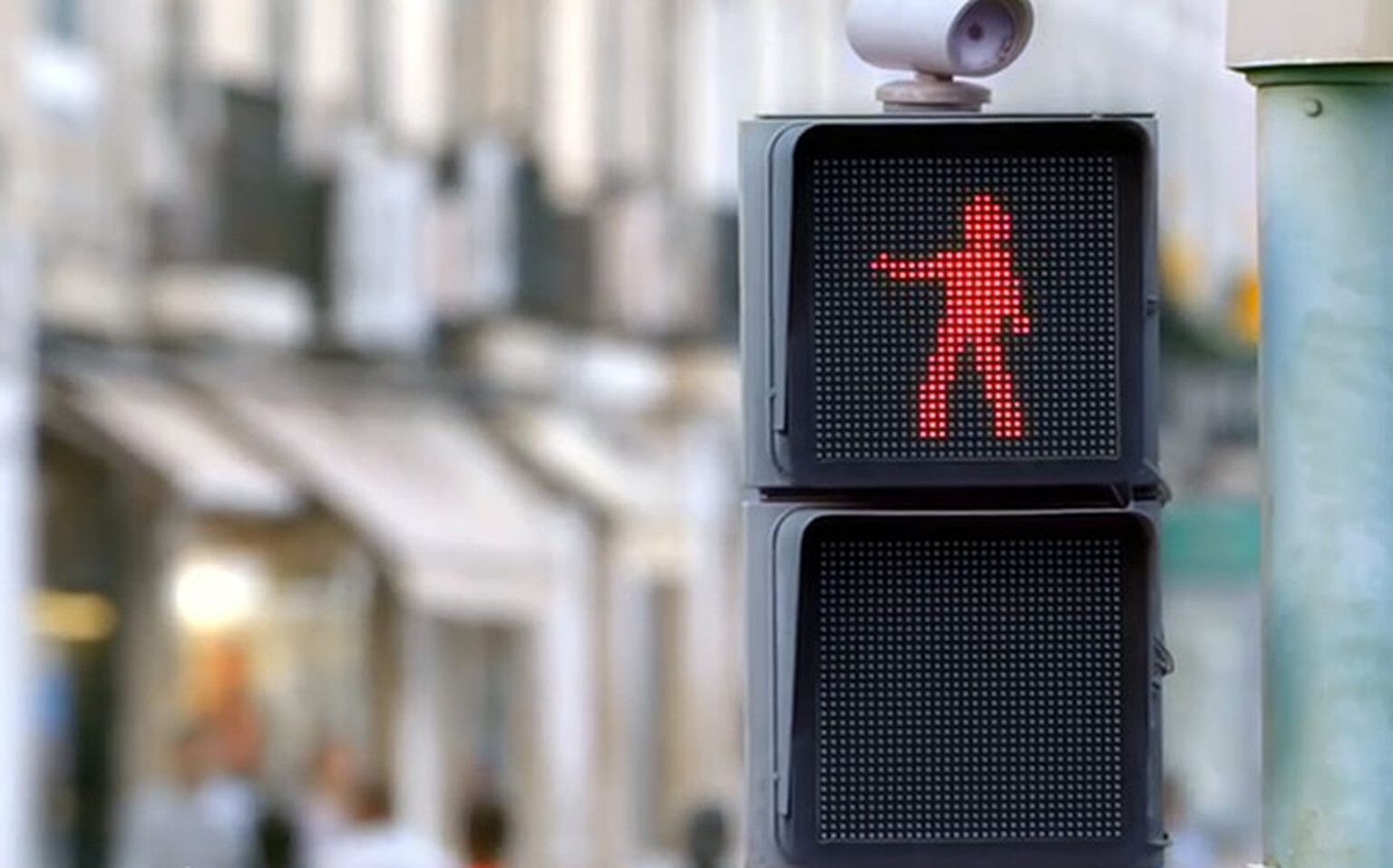 This dancing pedestrian signal wants to help you cross the road
