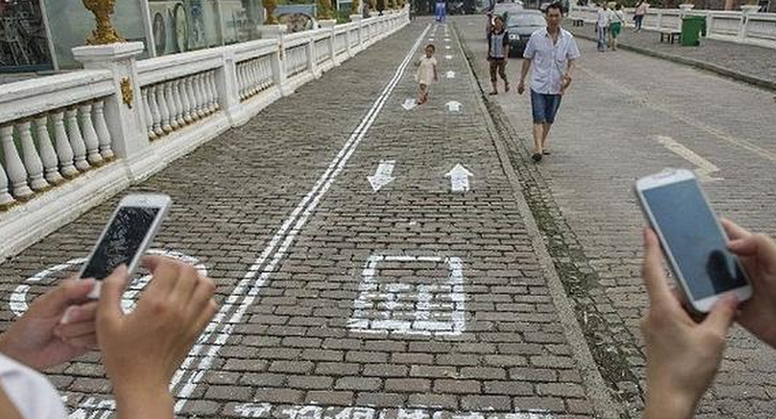 China launches cellphone lanes for distracted pedestrians