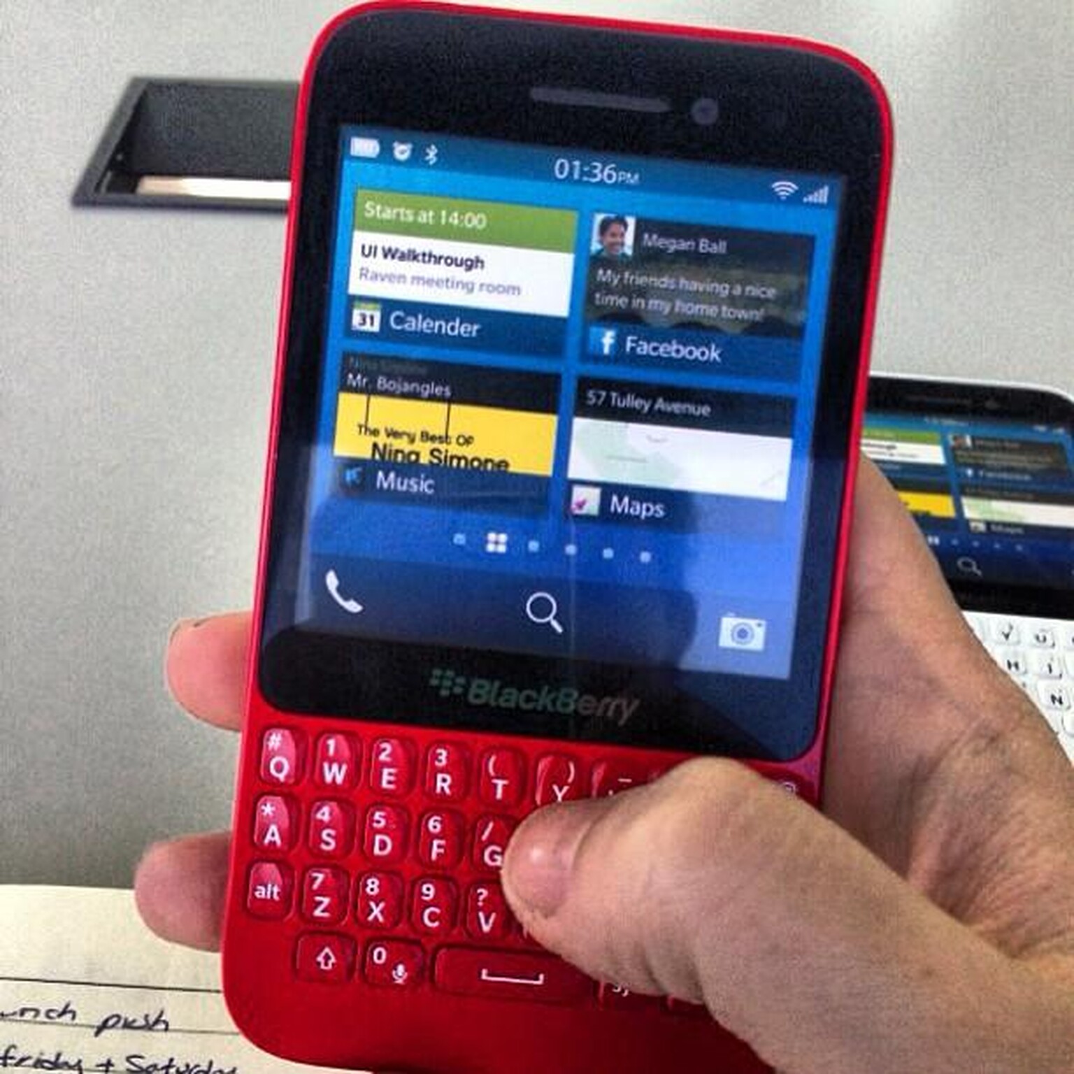 Red BlackBerry R10 poses for the camera, specs detailed