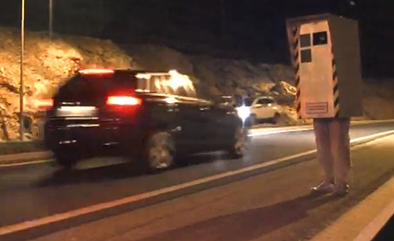 Prankster Remi Gaillard dresses up as speed camera and flashes motorists