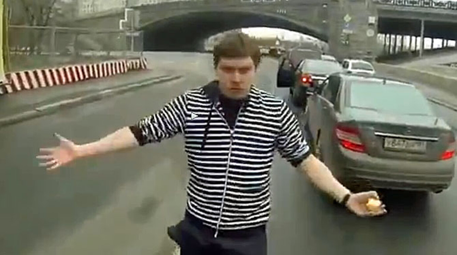 Angry russian motorcyclist takes a motorised saw to Nissan Juke