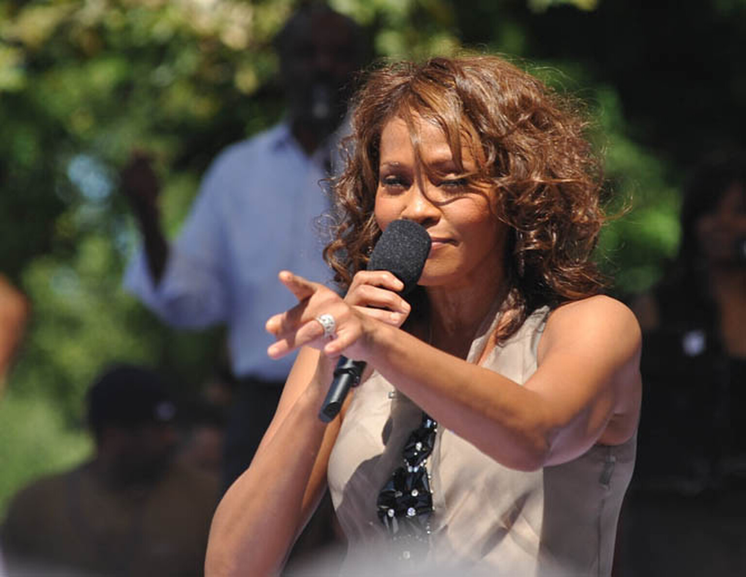 Plane makes emergency landing because of woman singing Whitney Houston songs