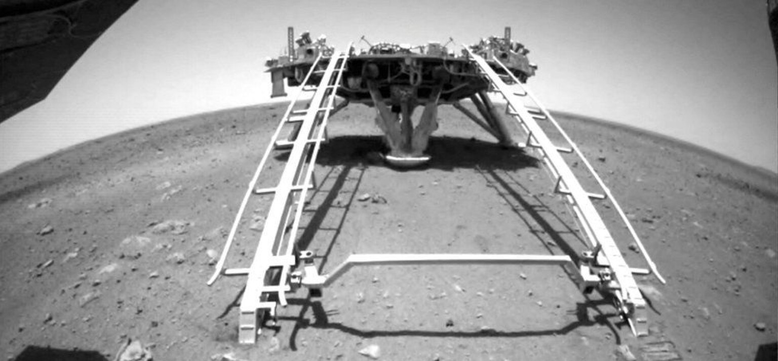 China's robotic rover has rolled onto Martian soil to begin its mission