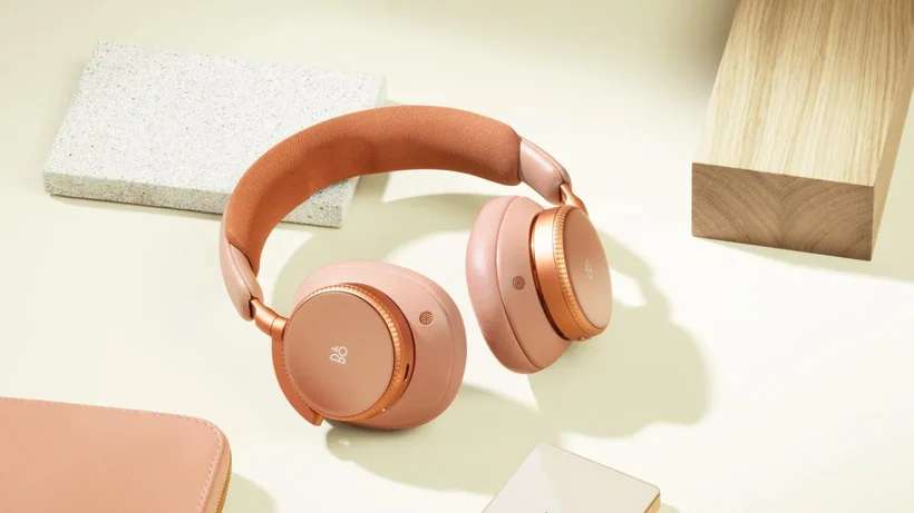 Beoplay H100 with some pink headphones