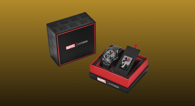 Citizen Spiderman Watch and its display box on a mustard to black gradient background 2