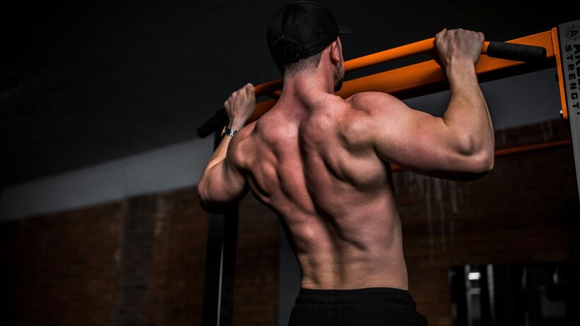 Muscular man working out