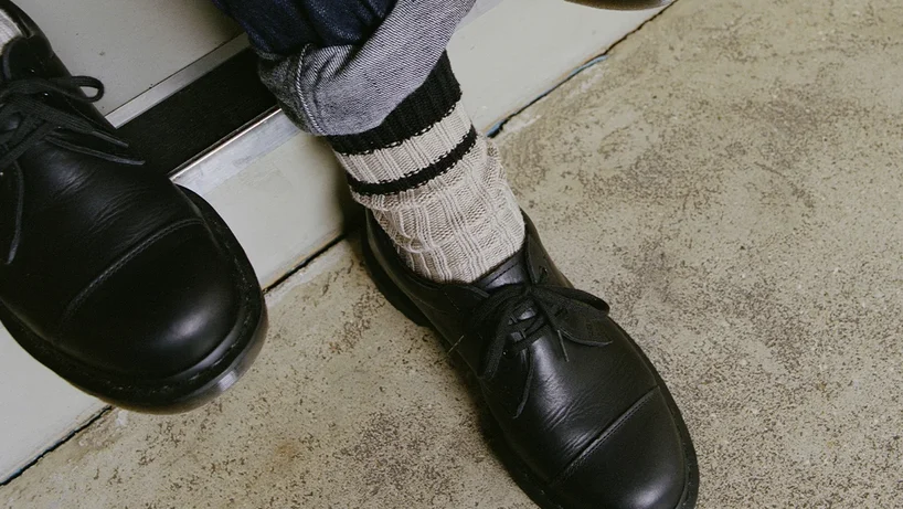 Margaret Howell reimagined Dr Martens shoes on a step