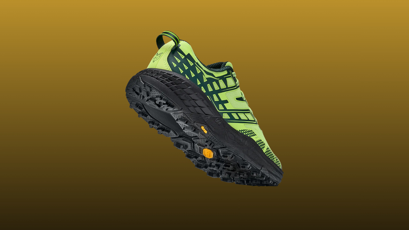 Hoka Speedgoat 2 back view on a mustard to black gradient background