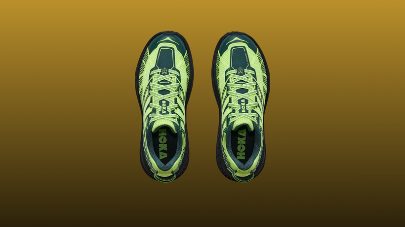 Hoka Speedgoat 2 top view on a mustard to black gradient background