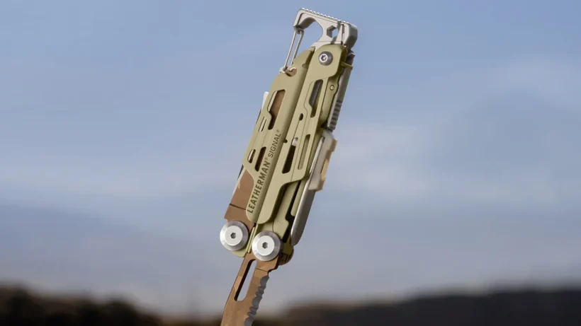 Leatherman Signal Sandstorm stuck into a tree