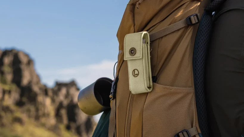 Leatherman Signal Sandstorm in a pouch attached to a backpack