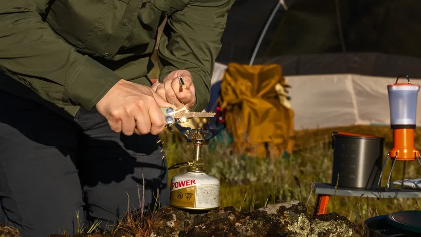 Leatherman Signal Sandstorm being used to start a fire
