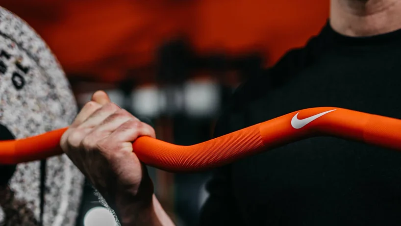 Orange Nike Shield Curl bar in use
