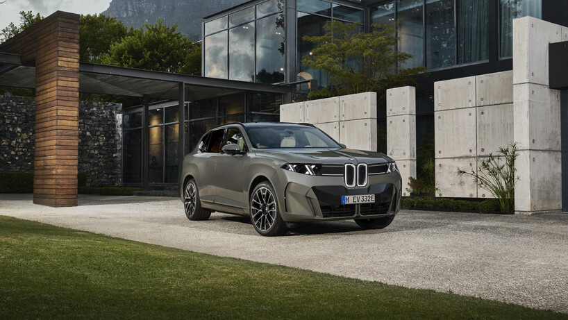 BMW X5 outside a house