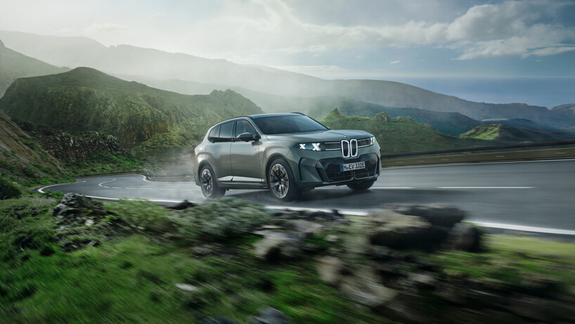 BMW X5 driving on the hills