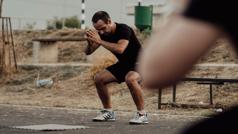 A man doing a squat