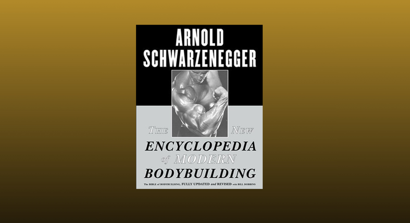 The new encyclopedia of modern body building on a mustard to black gradient background