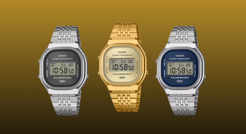 Three Casio A140 on a mustard to black gradient background