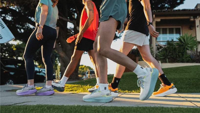 A group of runners wearing Journey 2 trainers
