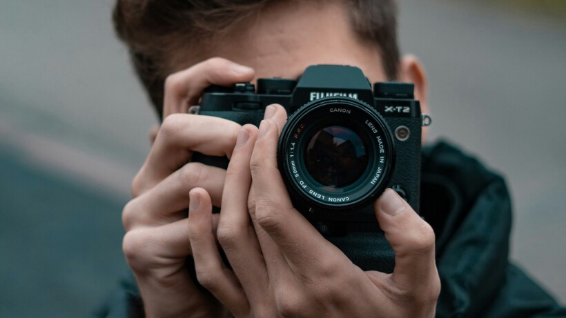 man taking pictures