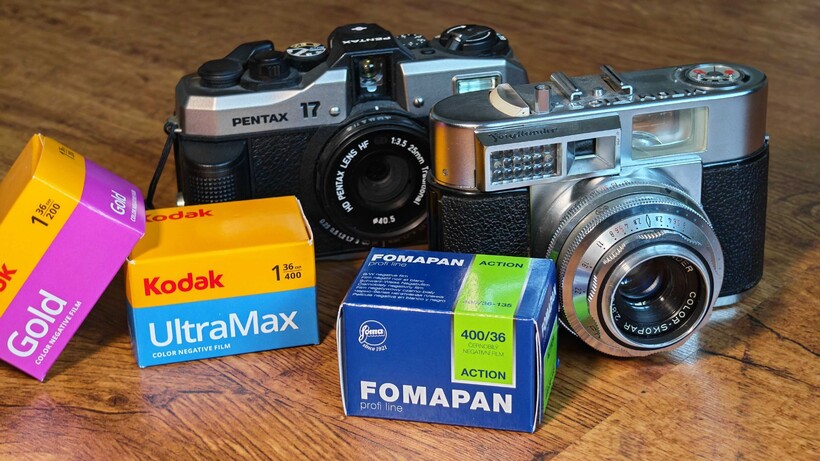 The Pentax 17 and a vintage Voigtlander film camera, adorned with film from Kodak and Fomapan